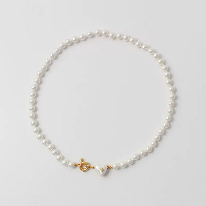 Women’s Stylish and Versatile Pearl Necklace – Exquisite Heart-Shaped Collarbone Chain (J1001)